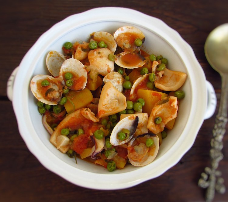 Cuttlefish with clams, peas and sweet potato served on a terrine