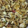 Clams with mustard on a frying pan