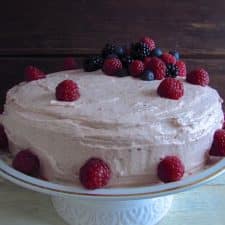 Chocolate cake with raspberry cream on a plate