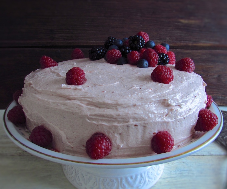 Chocolate cake with raspberry cream on a plate