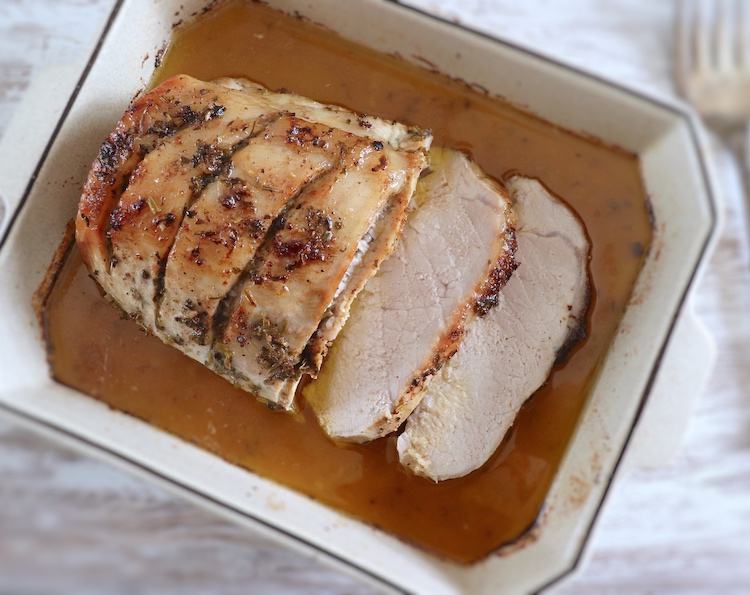Pork loin with spices on a baking dish