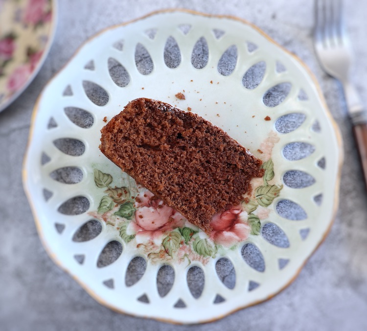 Slice of chocolate coffee cake on a plate