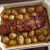 Pork ribs in the oven with honey and mustard on a baking dish