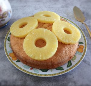 Soaked pineapple cake on a plate
