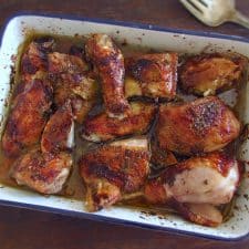 Roasted bittersweet chicken on a baking dish