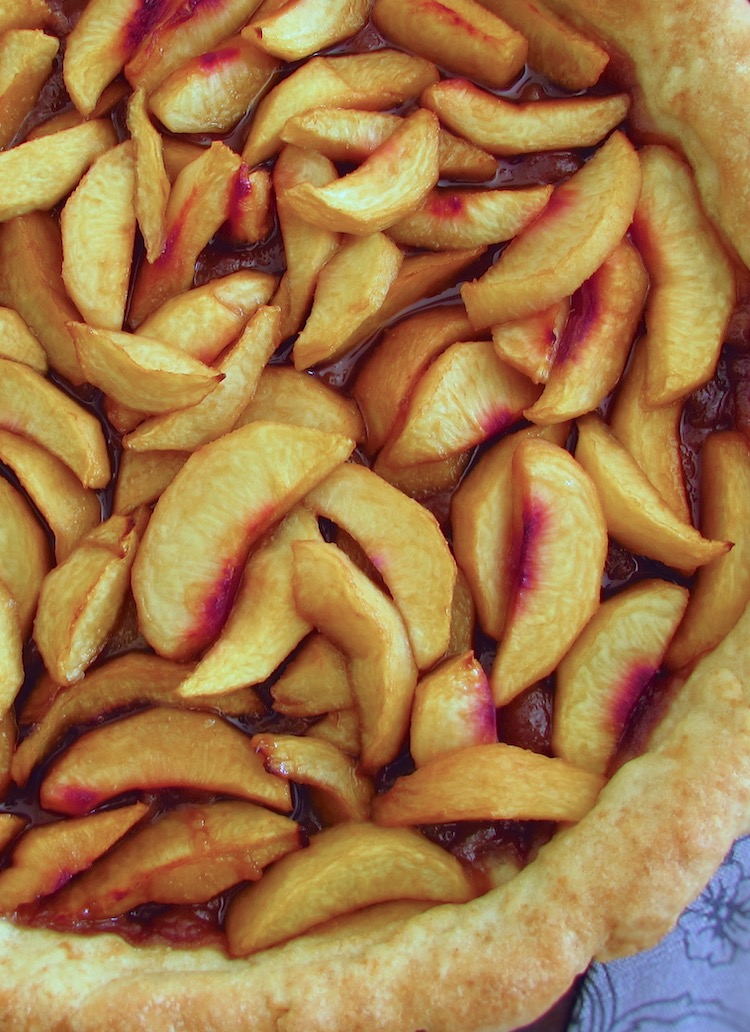 Peach pie on a plate