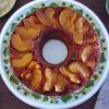 Cinnamon cake with caramelized apple on a plate
