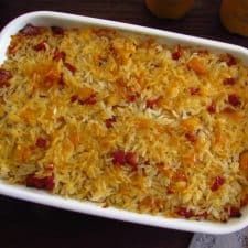 Baked rice with cod and chouriço on a baking dish
