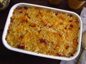 Baked rice with cod and chouriço on a baking dish