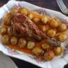 Roasted turkey leg with honey and spices on a serving platter