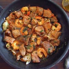 Pork with shrimp on a frying pan