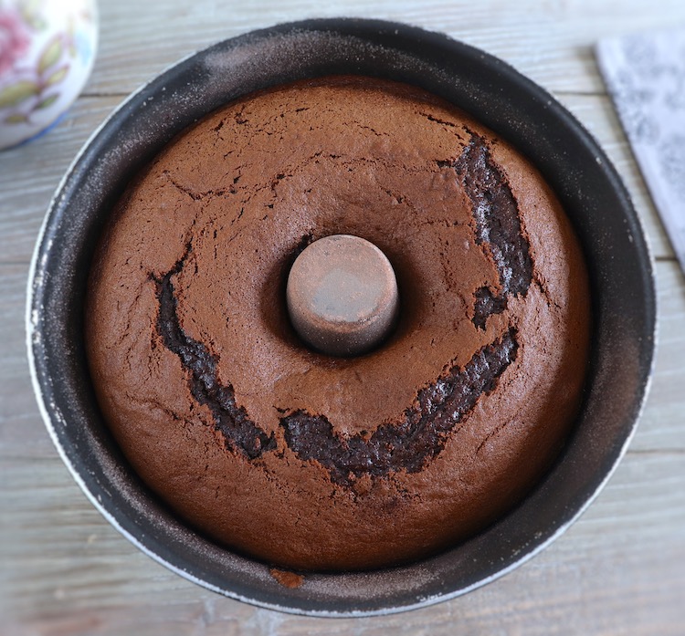Chocolate and raspberry cake on a bundt cake pan