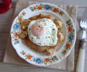 Fried chicken with egg on a plate