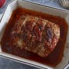 Homemade roasted pork loin on a baking dish