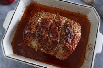 Homemade roasted pork loin on a baking dish