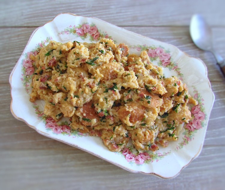 Migas with Portuguese chouriço on a platter