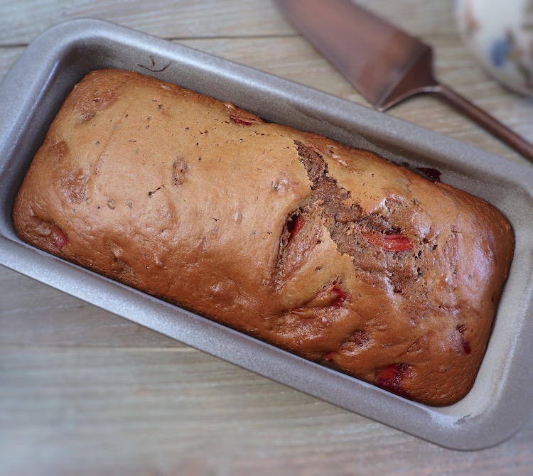 Strawberry loaf cake on a loaf pan