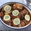 Easy baked chicken with cinnamon and lemon on a baking dish