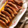 Portuguese Pork Ribs with Garlic and Mustard served on a platter