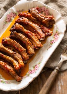 Portuguese Pork Ribs with Garlic and Mustard served on a platter
