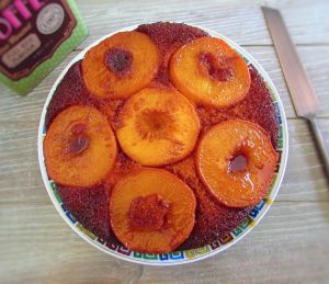 Peach upside down cake on a plate