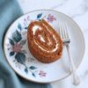 Slice of Swiss Roll Cake on a plate