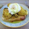 Stewed chicken with poached eggs on a plate