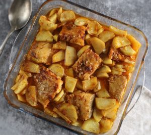 Easy Baked Cod with Potatoes in a glass baking dish
