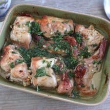 Baked rabbit with homemade sauce on a baking dish