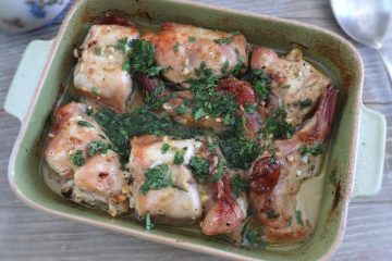 Baked rabbit with homemade sauce on a baking dish
