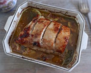 Roasted pork loin with lemon and rosemary | Food From Portugal on a baking dish