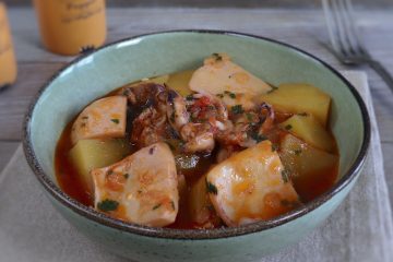 Cuttlefish stew with potatoes on a dish bowl