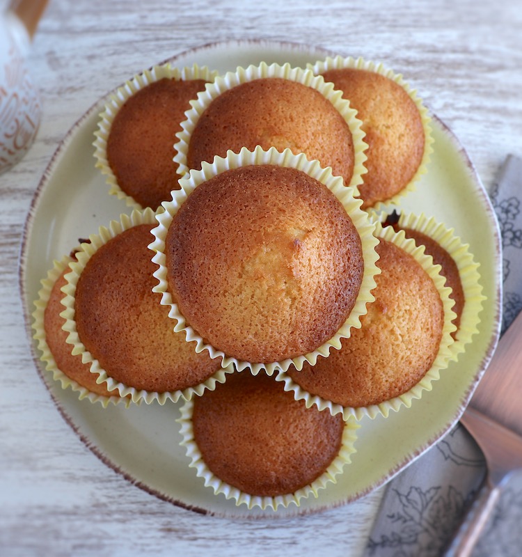 Lemon chocolate chip muffins on a plate