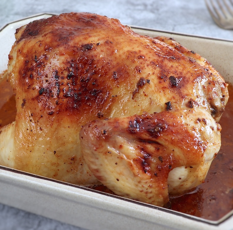 Frango no forno com limão e mel numa assadeira