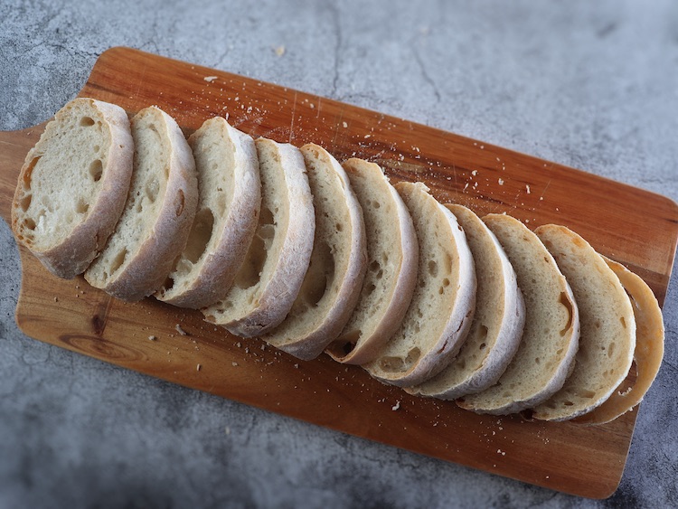 Bread slices on a wooden board