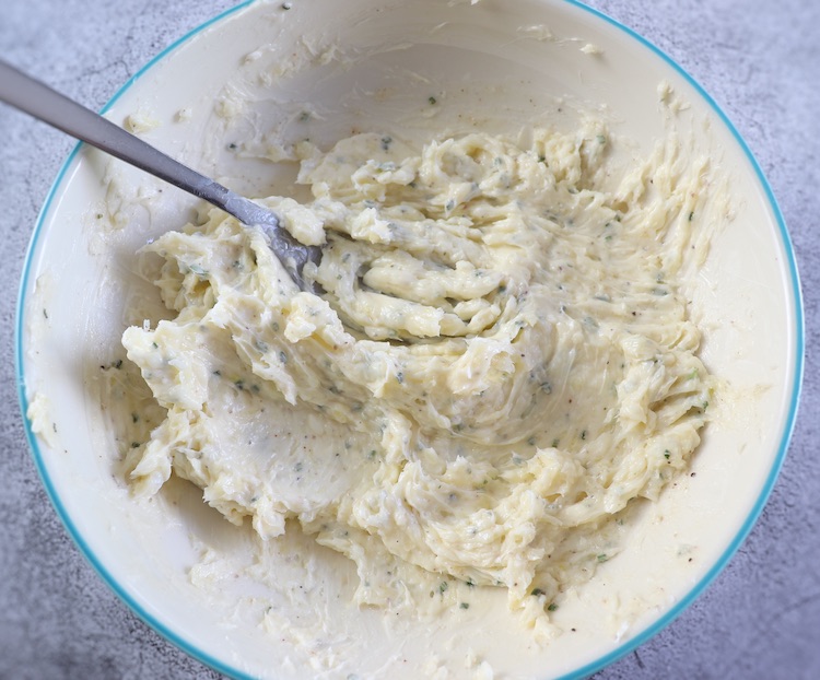 Butter and garlic mixture on a dish bowl