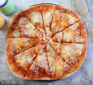 Easy ham and cheese pizza on a table