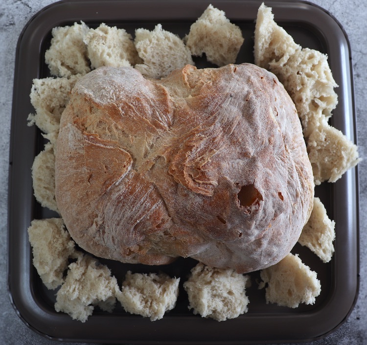 Stuffed bread on a baking pan