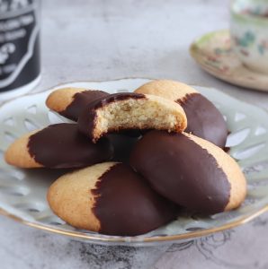 Chocolate dipped shortbread cookies on a plate