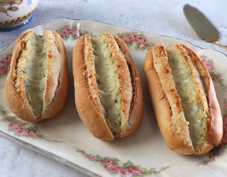 Easy cheesy garlic bread on a platter