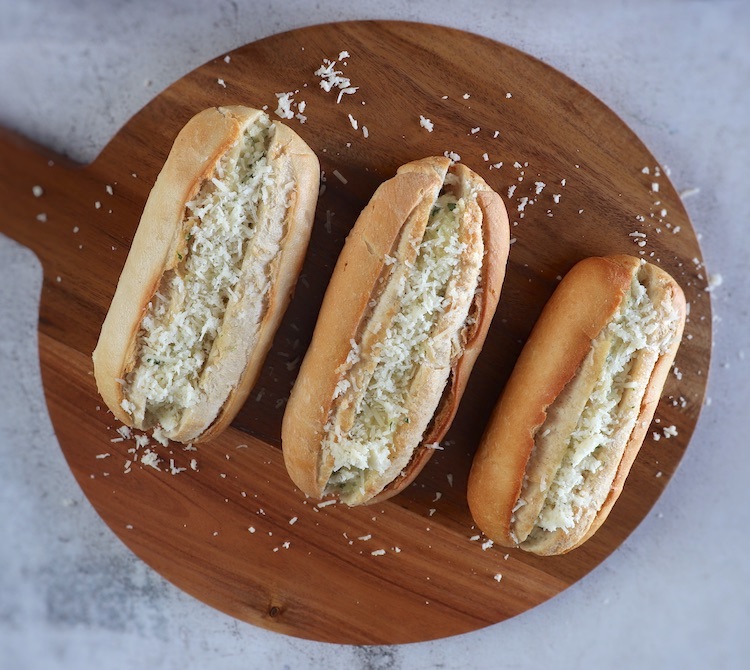 Easy cheesy garlic bread on a wooden board