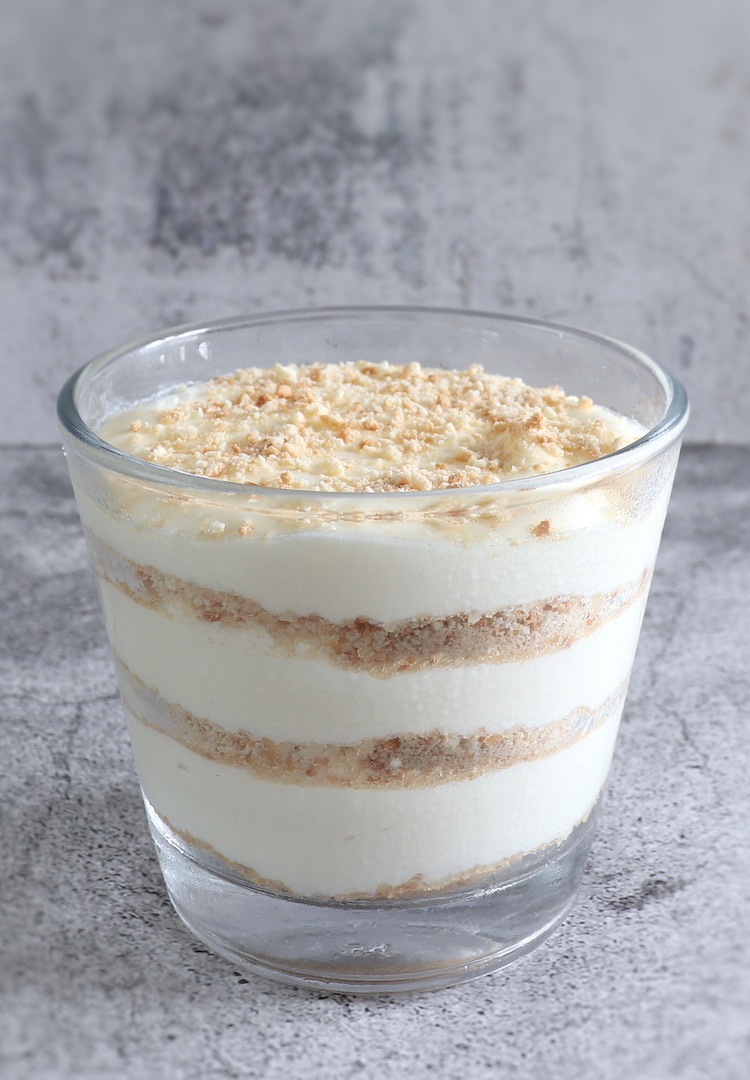 Portuguese sawdust pudding on a small glass bowl