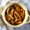 Air fryer french fries in a small saucepan