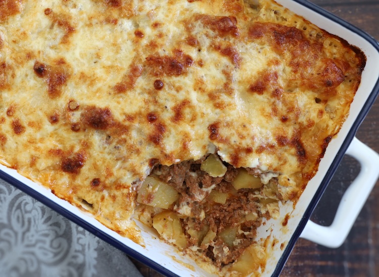 Ground beef and potato casserole in a baking dish